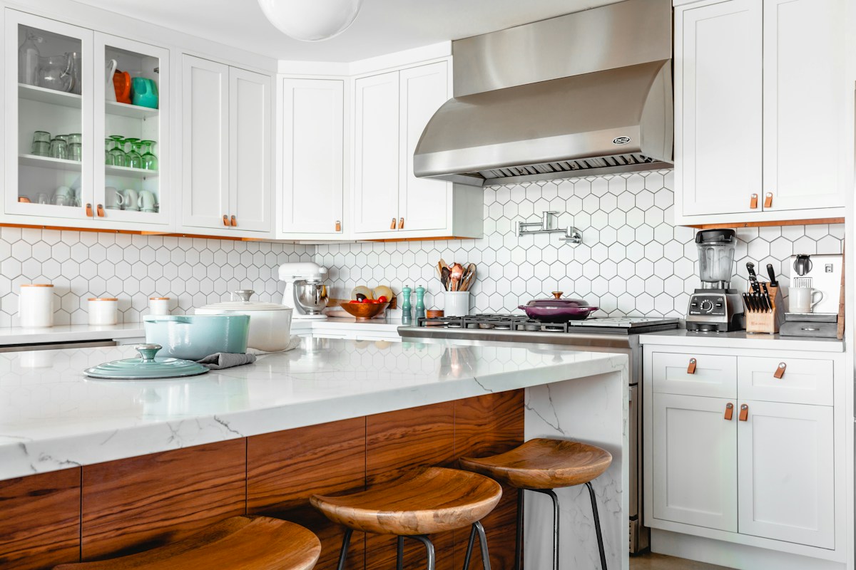 A light-filled kitchen with clean counters